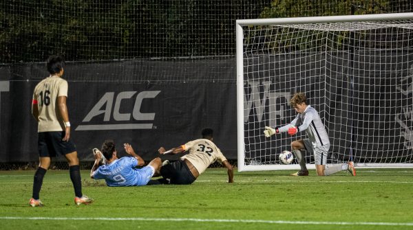 Junior goalkeeper Trace Alphin makes a save during the first round of the ACC Tournament. UNC beat Wake Forest, 1-0.