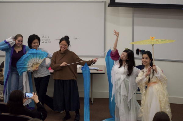 Students get involved and interact with the props used in Chinese dance.