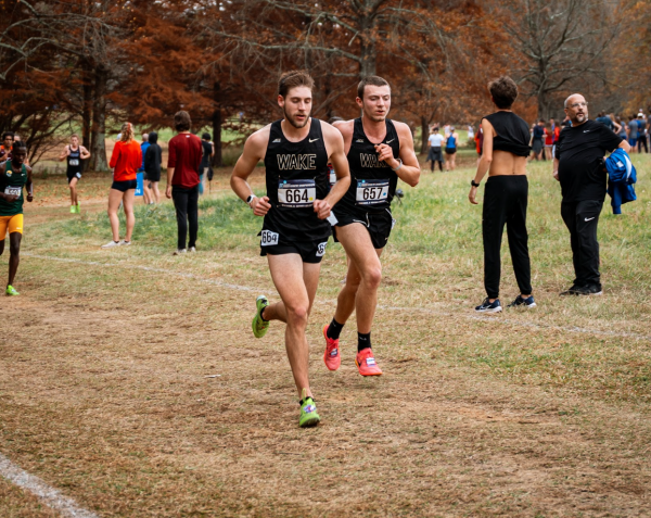Rynard Swanepoel (left) and Hunter Jones (right) run the Panorama Farms course in Earlysville, Va. (Courtesy of Wake Forest Athletics)
