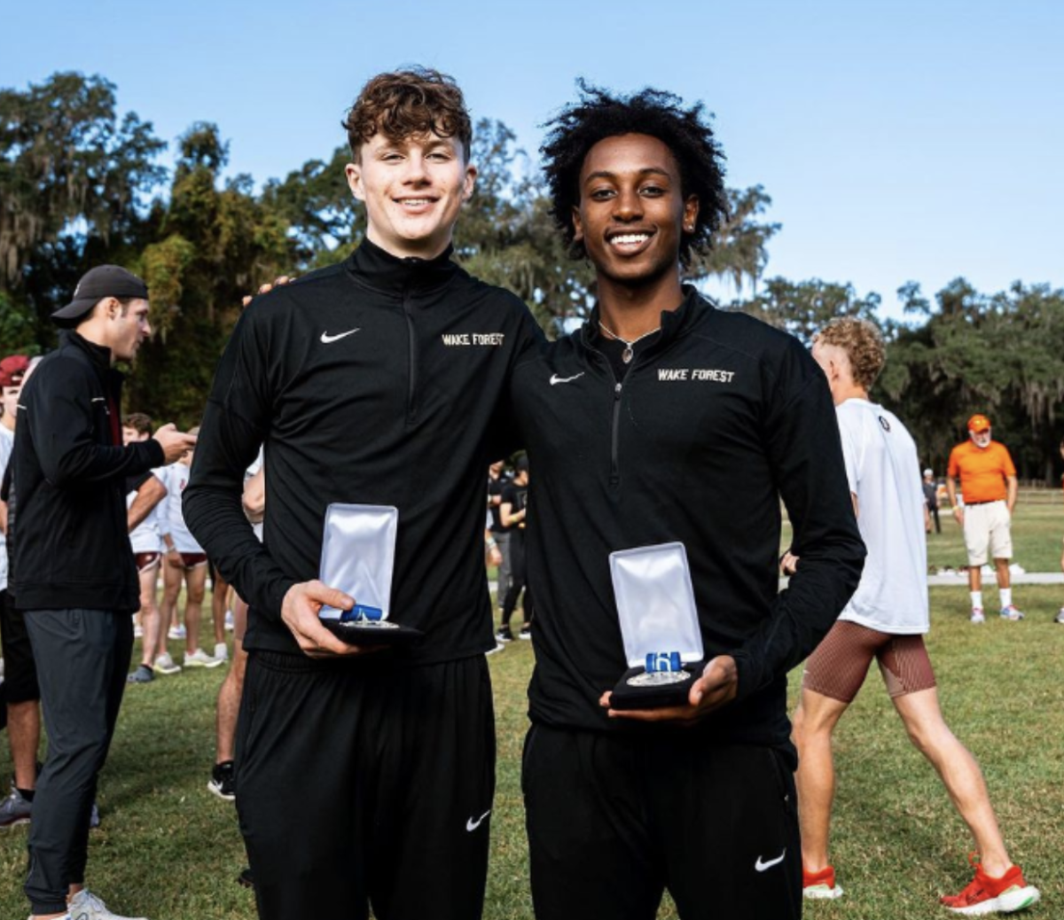 Joe O’Brien (left) and Luke Tewalt (right) pose with their All-ACC medals after Friday morning’s conference championship meet (Courtesy of WFU Athletics).
