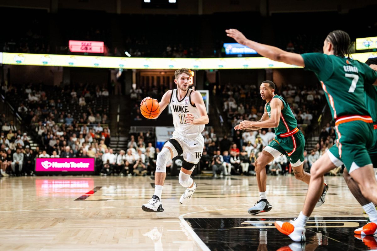 Senior forward Andrew Carr (7pts, 8reb) drives into the lane (Courtesy of Wake Forest Athletics).