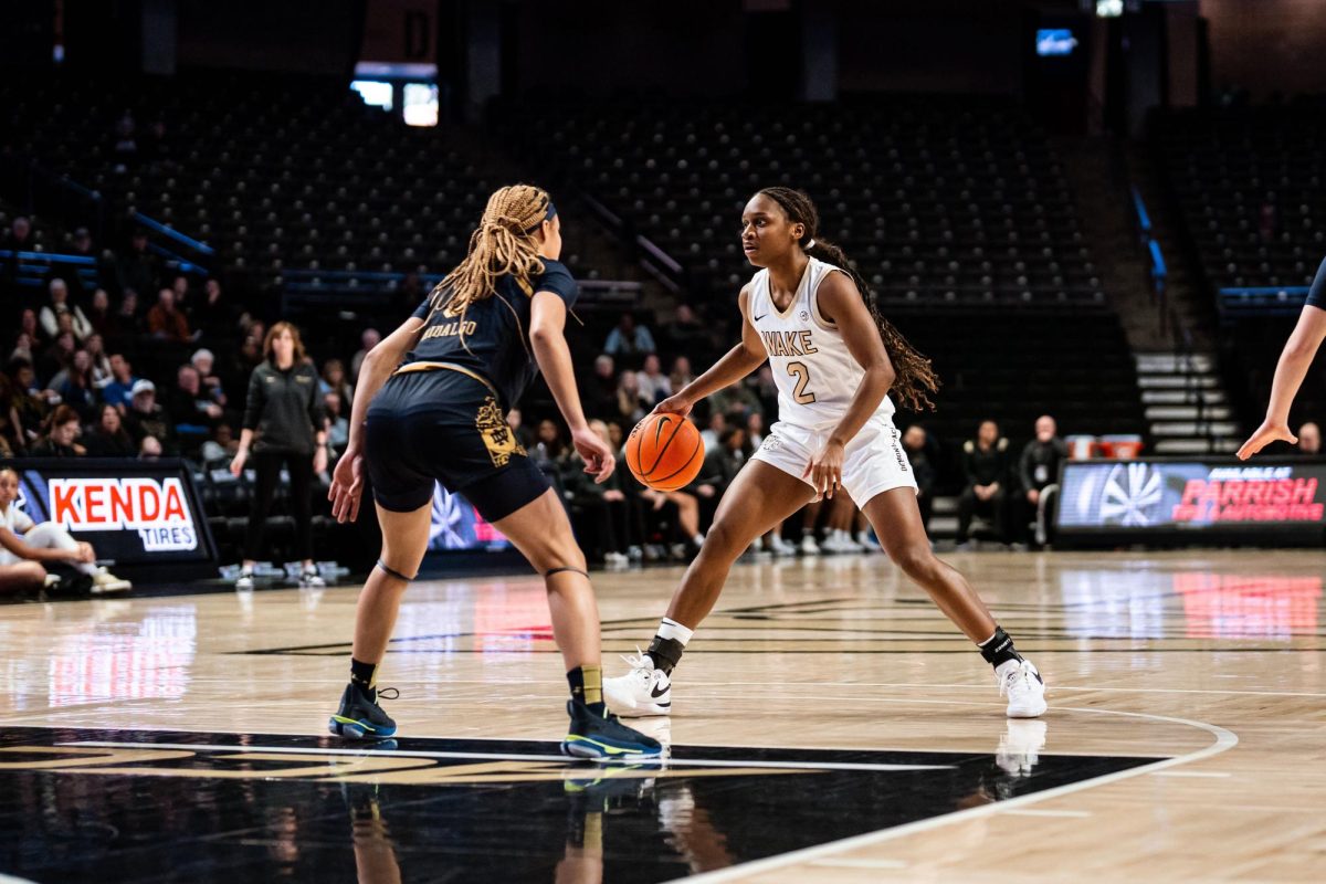 Starting guard Kaia Harrison (2) looks to drive against Notre Dame’s Hannah Hidalgo (3). Harrison had six points and three assists in the matchup. (Courtesy of Wake Forest Athletics)