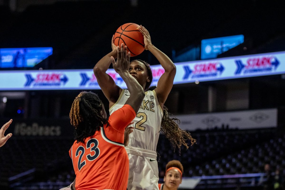 Kaia Harrison (2) takes her shot just over the UVA defender’s hands.