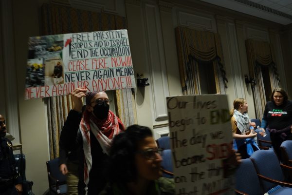 On Feb. 19, Winston-Salem protestors held signs during the city council meeting including phrases such as “stop bombing kids”and “Your tax $$$ are dropping bombs on babies.”