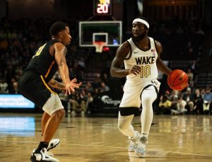 Jao Ituka (10) brings the ball up the floor on Dec. 14, 2022 for Wake Forest.