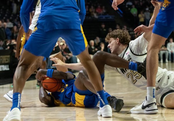 Wake Forests Zach Keller dives for a loose ball during a win over Pitt at the Joel on February 20th. 