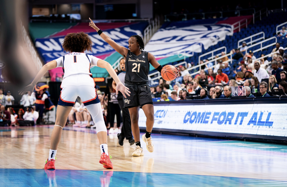 Elise Williams (21) looks to set up the offense against the Virginia Cavaliers. Williams had 25 points en route to an upset win. (Courtesy of Wake Forest Athletics)