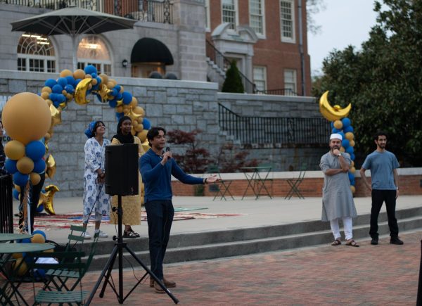 President of the Muslim Student Association addresses the crowd as they gather at the Manchester plaza to celebrate the breaking of the Ramadan fast on April 2nd, 2024 at sundown.