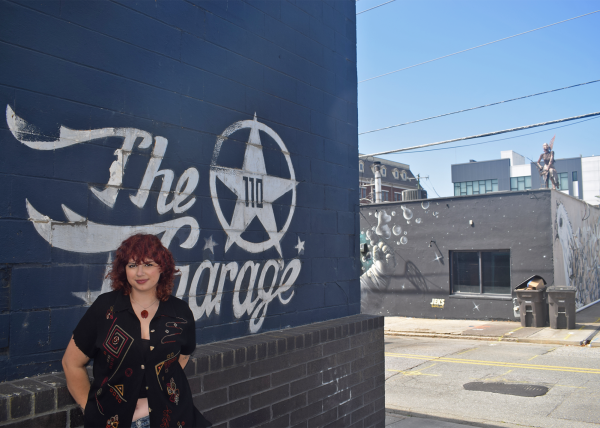 Ella Klein stands in front of the last remnants of the Garage, which is now the ARTC Theatre. (Courtesy of Sidney White)