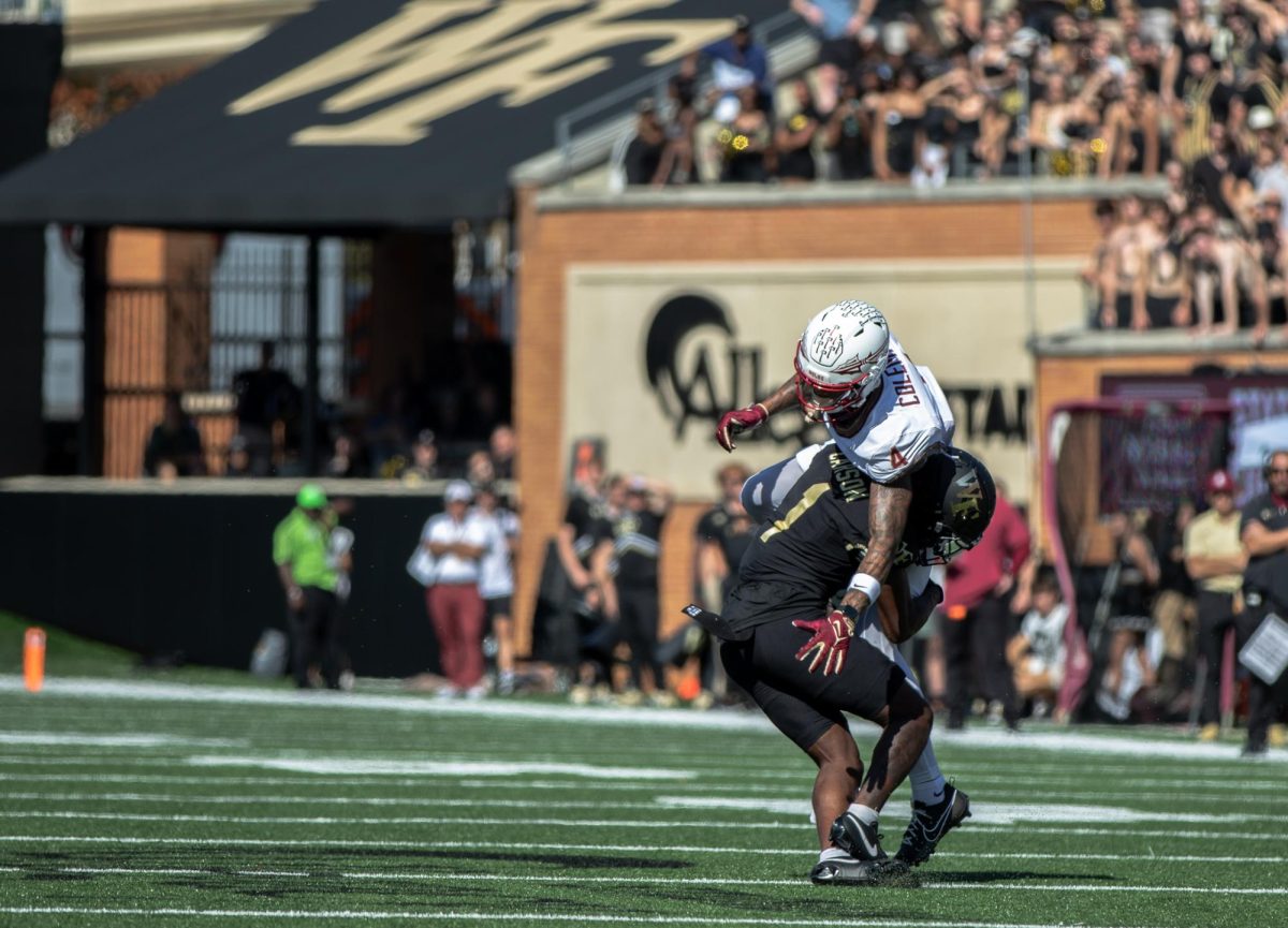 Caelen Carson (1) attempts to tackle Florida State’s Keon Coleman (4) during the 2023 season. Carson, the 174th overall pick in the 2024 NFL Draft, played 60 defensive snaps for the Dallas Cowboys in Week 1.