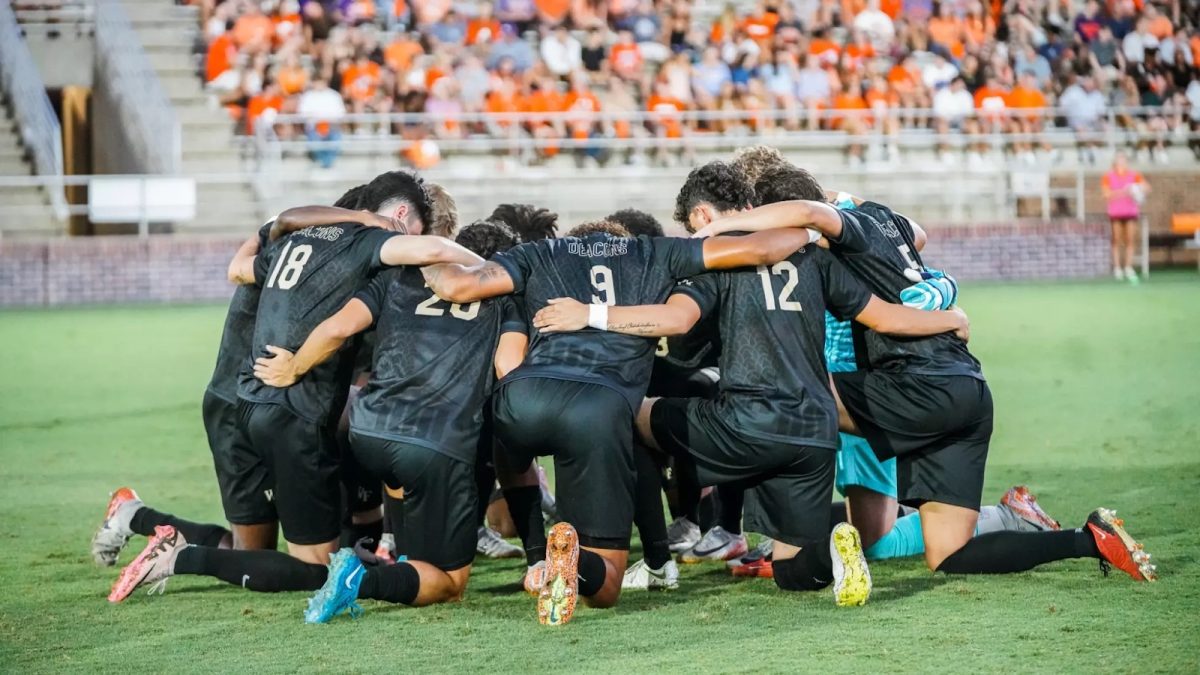 Wake Forest Men’s Soccer squad huddles together during this past weekend’s loss to No. 4 Clemson. (Courtesy of Wake Forest Athletics)