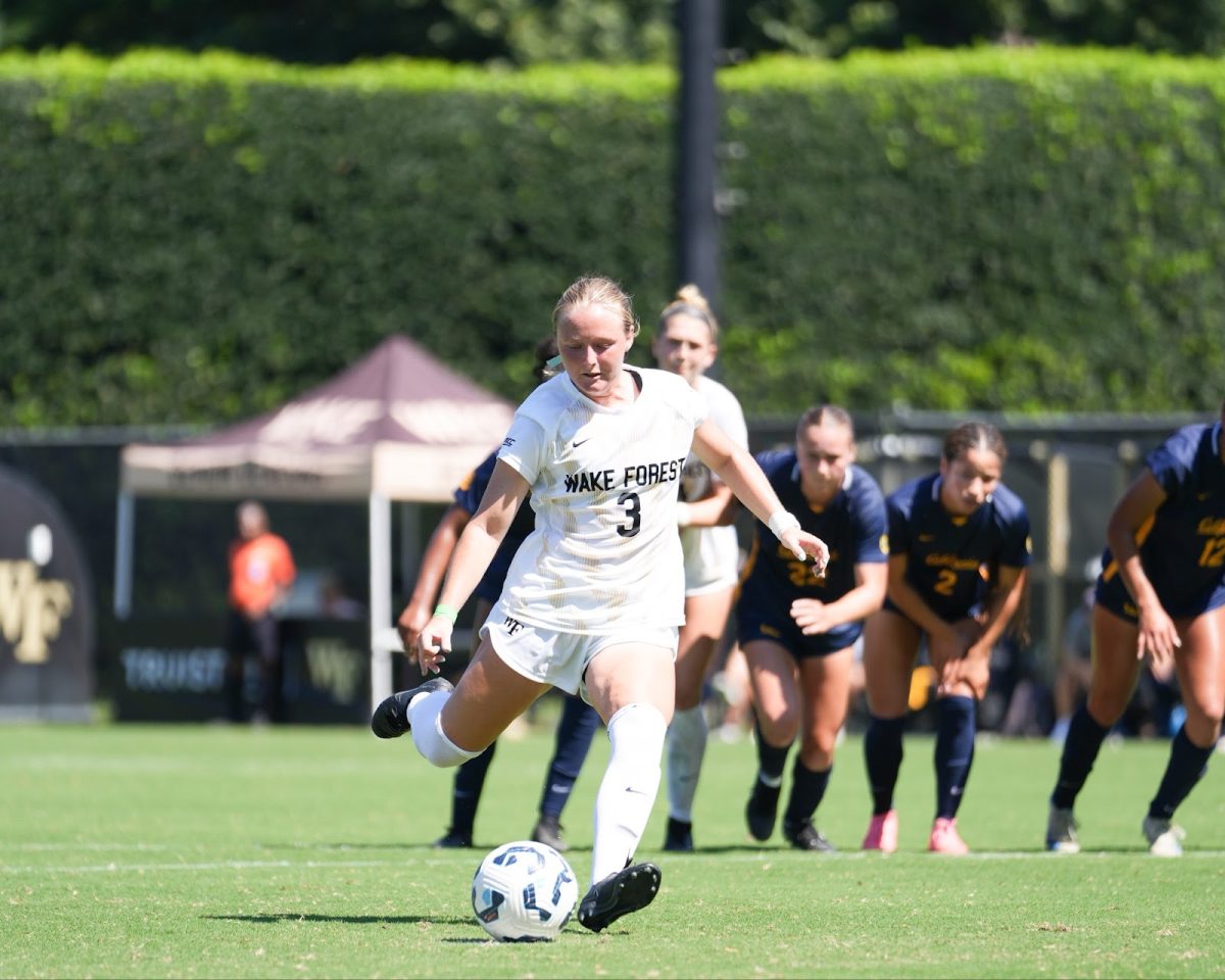 Senior midfielder Emily Colton (3) scores on a free kick in Sunday afternoon’s match against California.