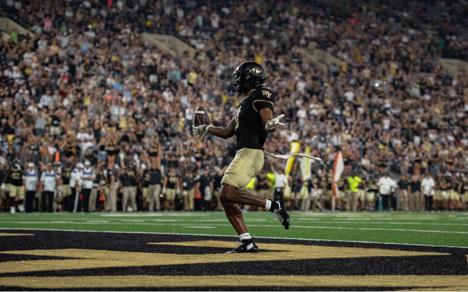 It’s been 685 days since Donavan Greene (11) last saw game action, but the redshirt junior wideout took no time to find the end zone — strutting in to put the Demon Deacons up four in the second quarter.