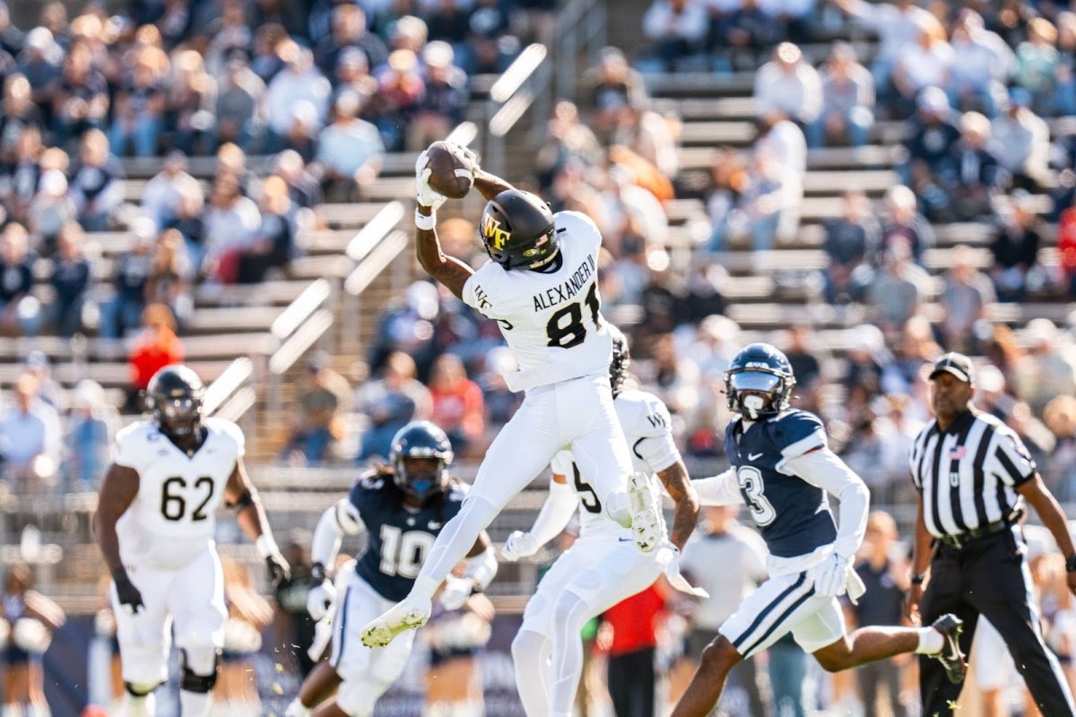 Wake Forest wide receiver Deuce Alexander (81) leaps in the air for a catch. Alexander had three catches for 36 yards. (Courtesy of Wake Forest Athletics)