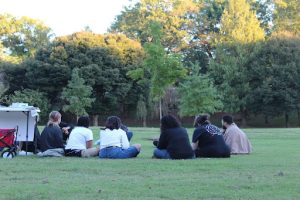 The group of students that gathered in a circle to discuss and listen to the three speakers. 