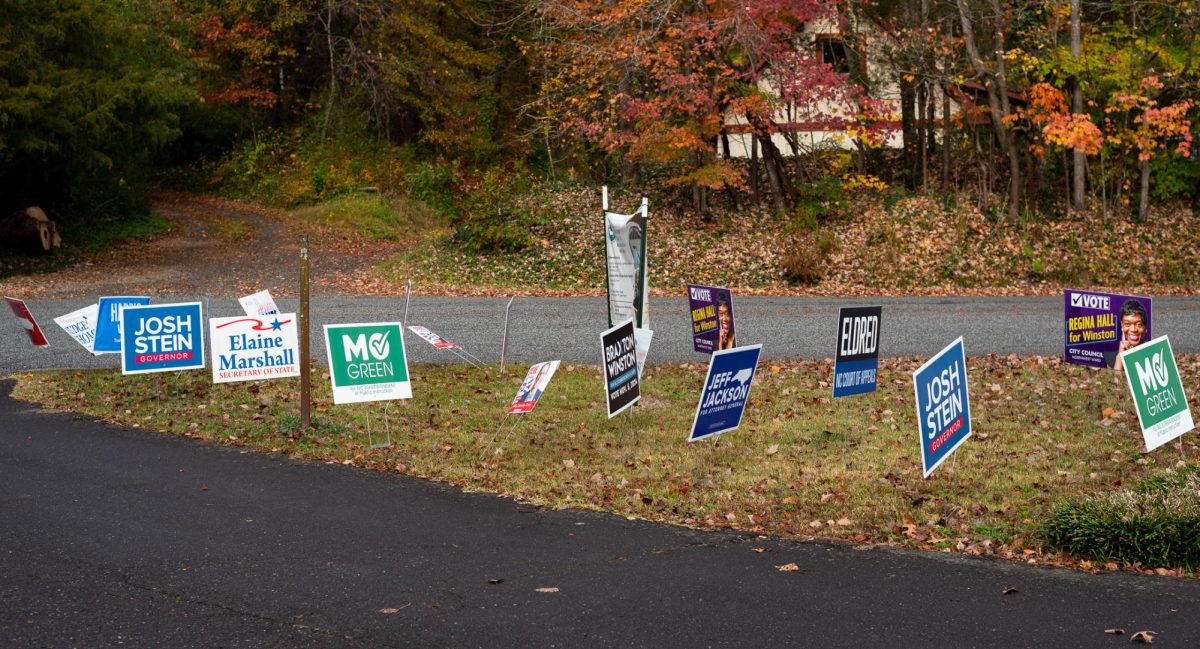 Campaign signs were placed alongside the road on Bethabara Moravian Church.