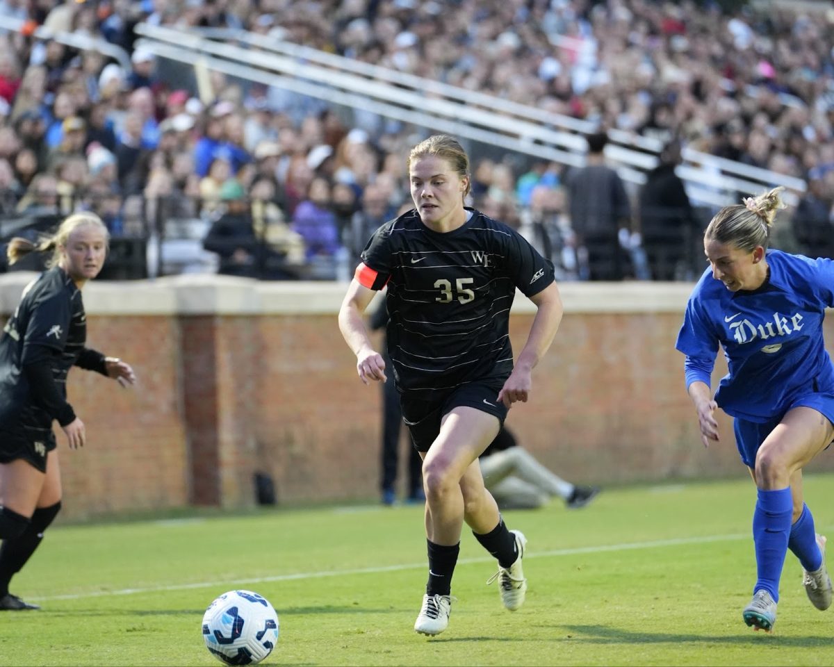 Senior forward Emily Murphy (35) sprints down the field in the first half in Sunday evening’s match against Duke.