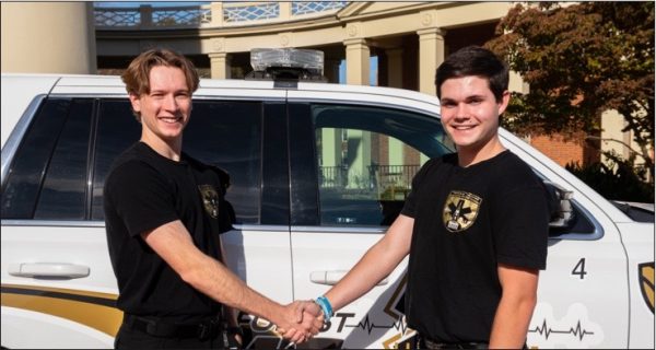 EMS Captain Nate Bozeman (left) and Chief Officer Hank Laxton (right) distributed the ‘Stop the Bleed Kits’ to address the growing threat of fentanyl and other mass trauma events on Wake Forest’s campus in hopes that students are well-equipped to assist others in emergency situations.