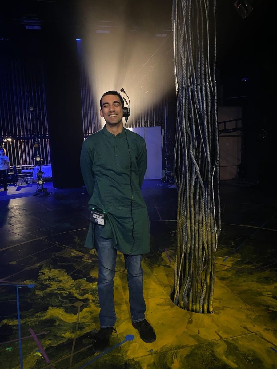 Senior Vir Gupta poses for a photo in his kurta before a student performance of “Love and Information” on Tedford Stage.