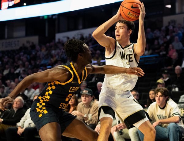 Parker Friedrichsen (7) holds the ball up on the perimeter.