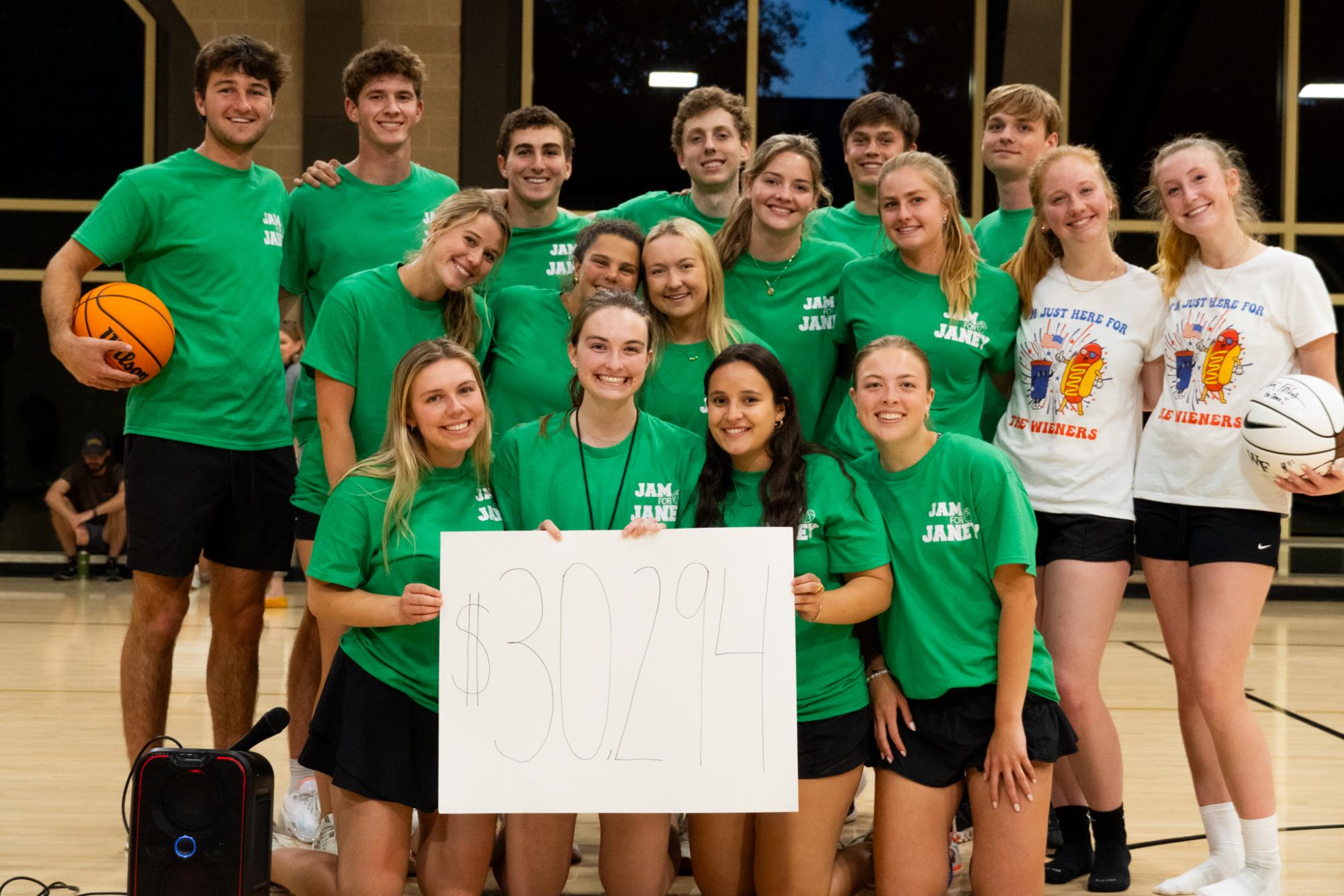 The Exec Team at Jam for Janey 2024 with our total donations/money raised. (Courtesy of Sadie Gorley)