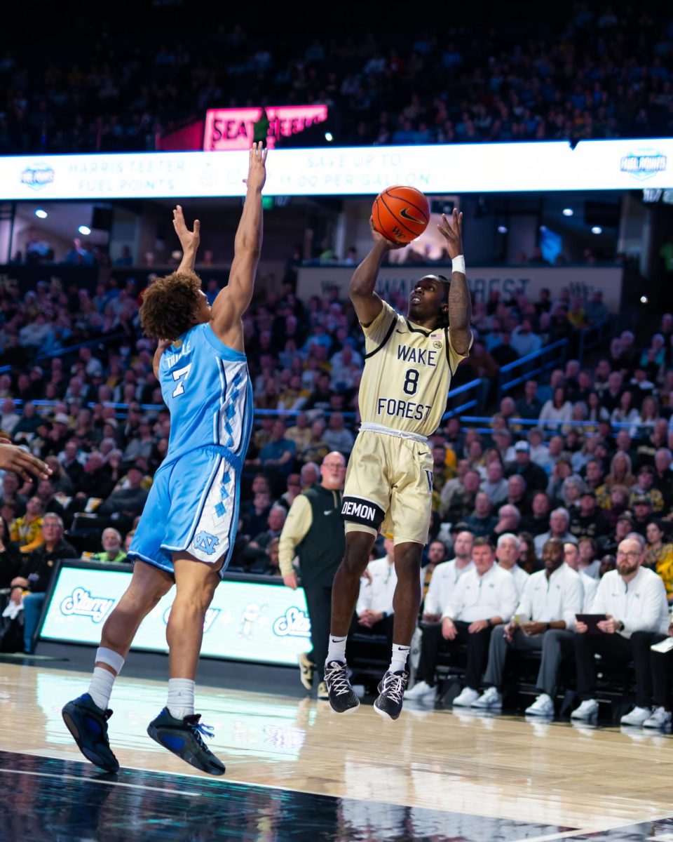 Ty-Laur Johnson (#8) rises for a mid-range jumper. He had 7 points in the matchup against UNC.