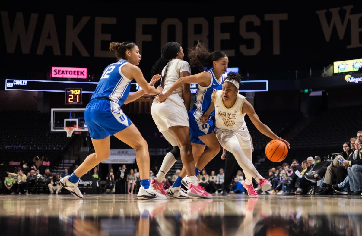 Wake Forest’s Tamia Jones (10) attempts to drive past a Duke defender. Jones finished with a pair of buckets.