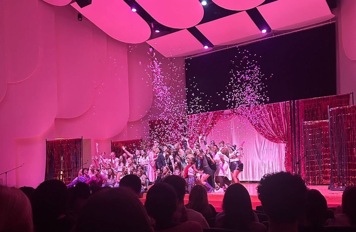 The cast of The 24 Hour Musical Project’s “Legally Blonde” celebrates under a shower of confetti at the conclusion of their show. 