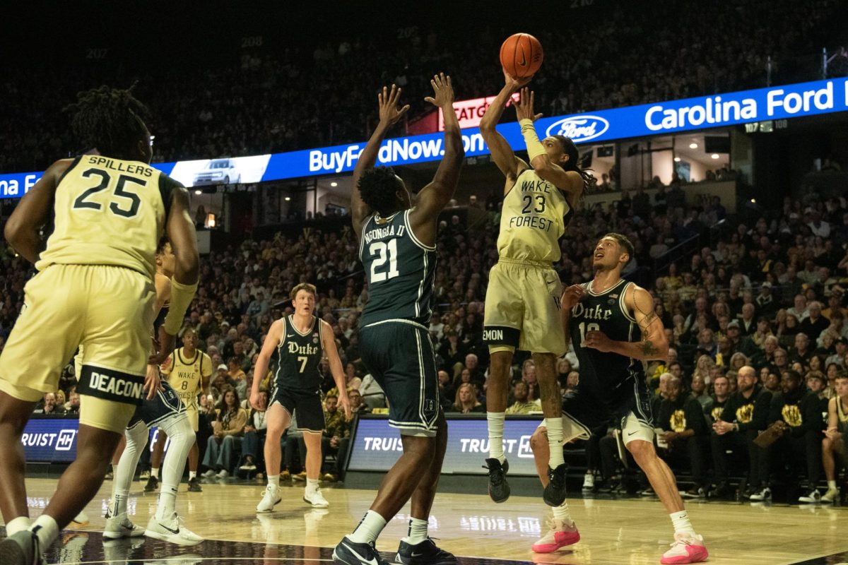 Duke's Patrick Ngongba II defends against Wake Forest in January. Now, the Blue Devils are headed to the Sweet 16.