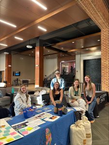 NAMI members table in Reynolds Gymnasium for an event, sponsored by the sleep wellness company Bearaby. (Photo Courtesy of Alyssa Totoro)