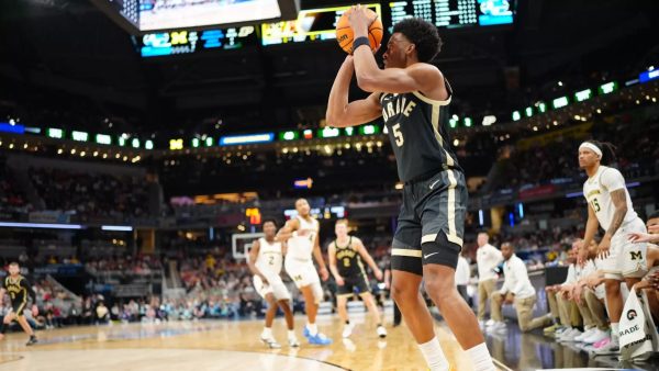 Myles Colvin (5) attempts a shot in the third round of the Big Ten Tournament against the Michigan Wolverines. Colvin had nine points and three rebounds in the 86-68 loss. (Photo courtesy of purduesports.com)
