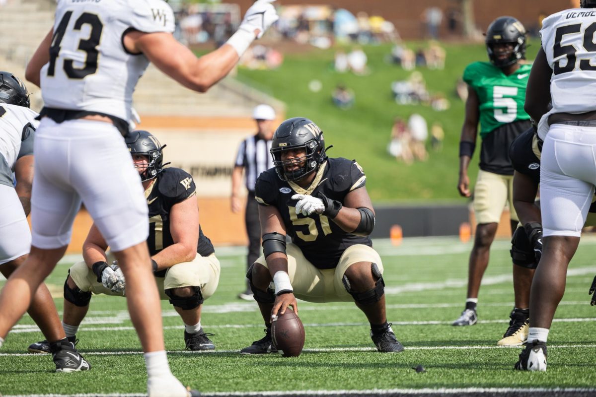 Wake Forest offensive lineman Devin McRae (51) gets set for a snap during the Wake Forest Football 2025 Spring Showcase. 