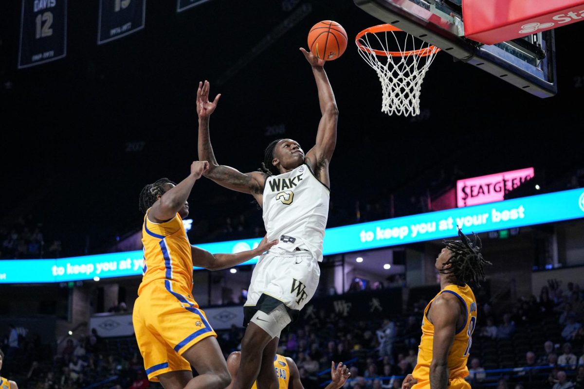 Tre'Von Spillers (25) throws down a dunk in the second half.