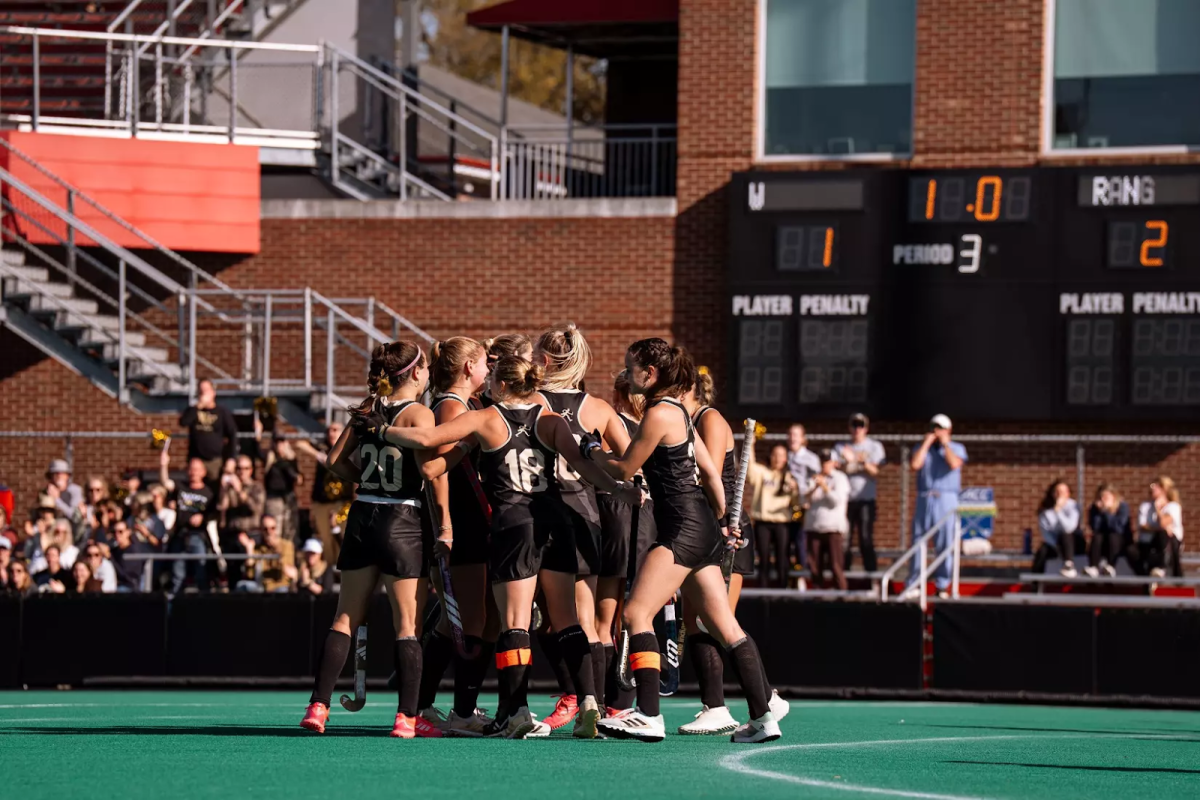 The Wake Forest Field Hockey huddles at the end of the third quarter. (Photo Courtesy of Wake Forest University Athletics).