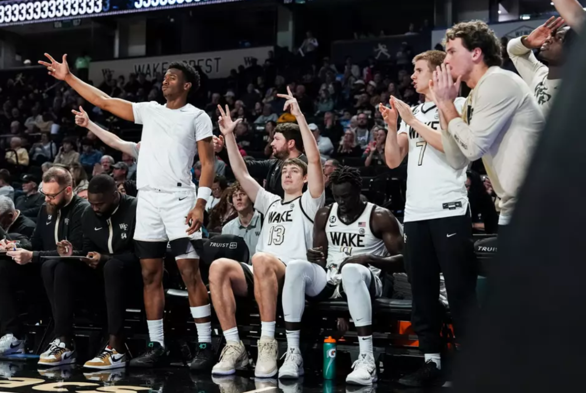 The Wake Forest bench cheers on their teammates in the Demon Deacons win over Campbell. (Photo Courtesy of Wake Forest Athletics)