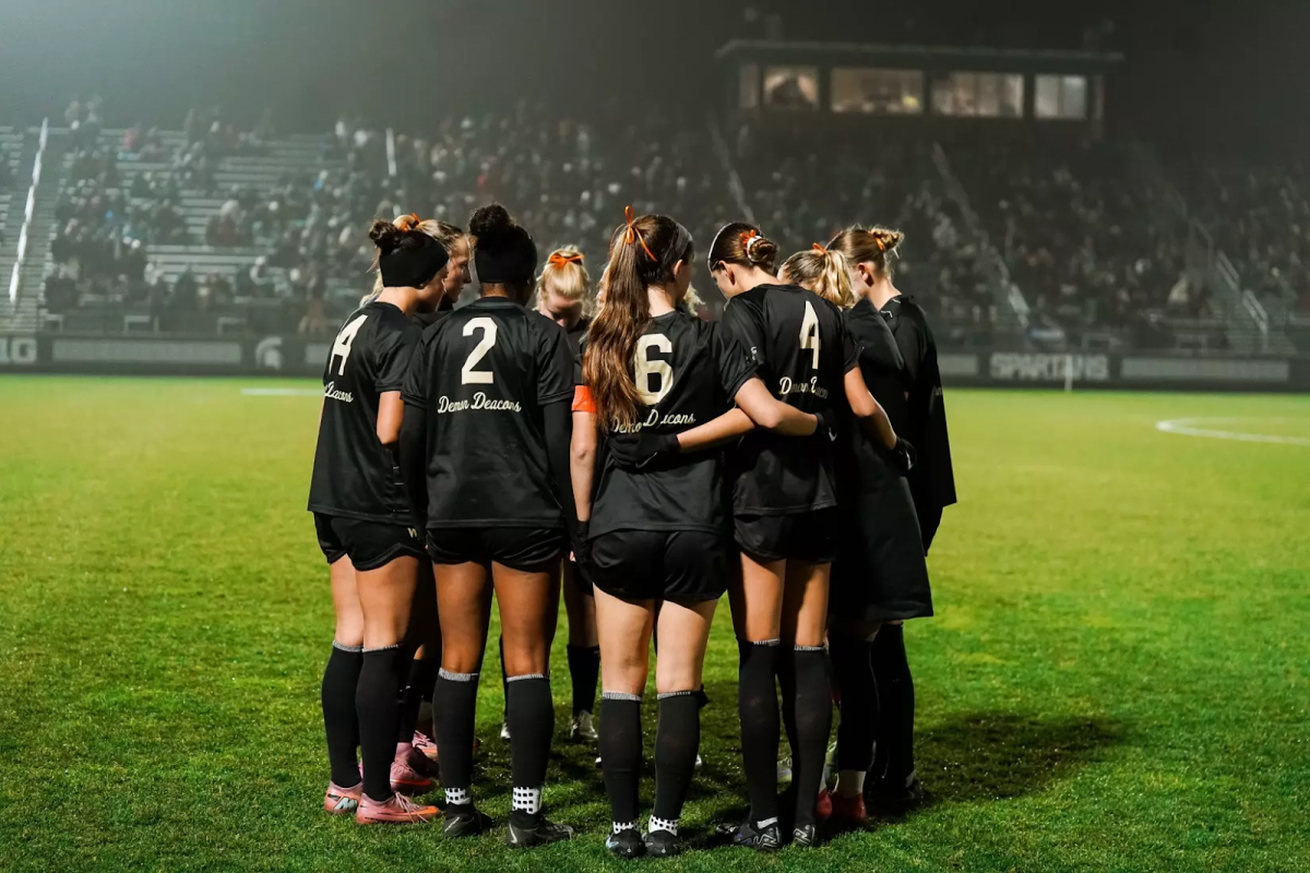 The Wake Forest Women’s Soccer team huddles in their NCAA Second Round Match at Michigan State. (Photo courtesy of Wake Forest Athletics)