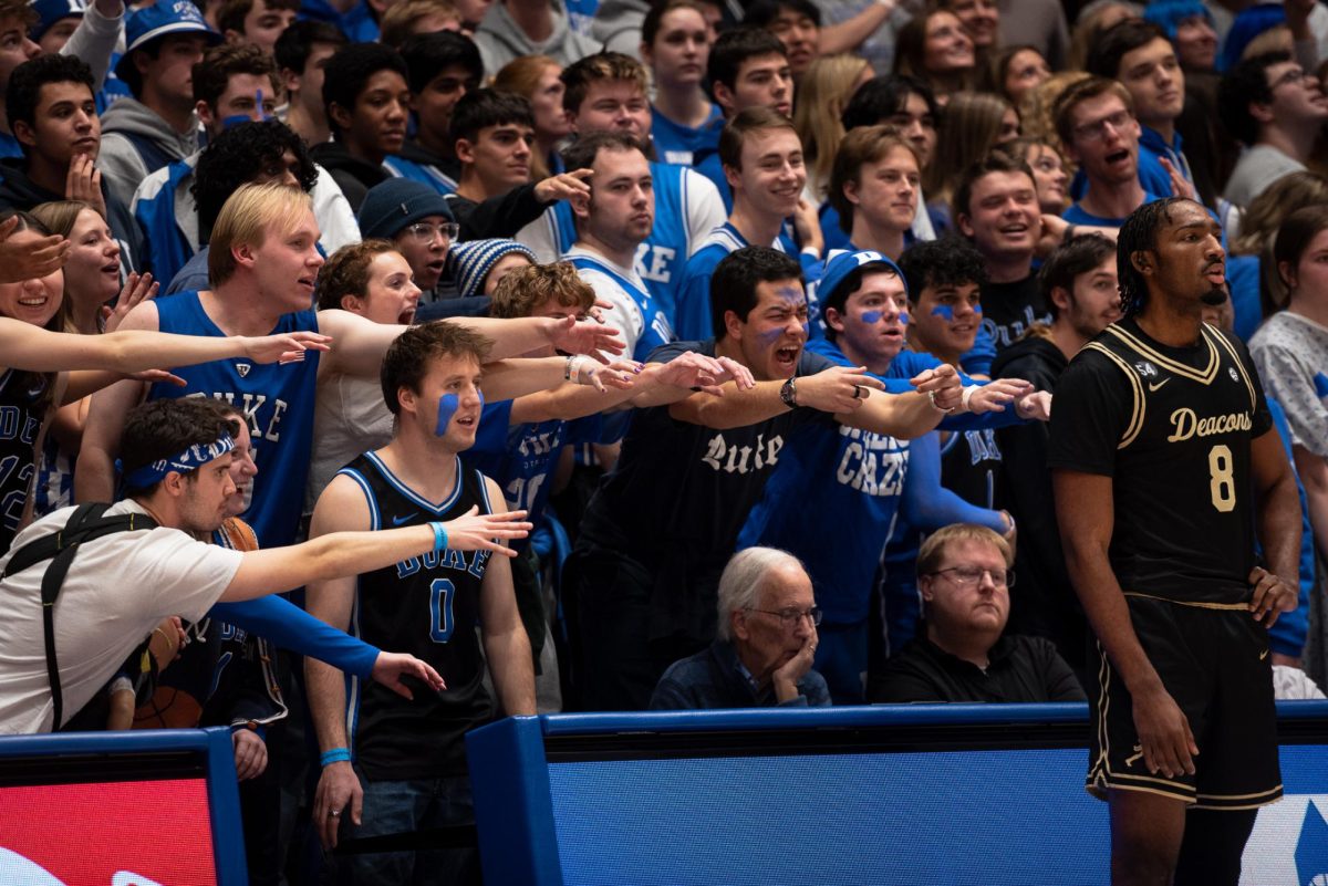 Mekhi Mason (8) prepares to inbound the ball before a row Cameron Crazies.