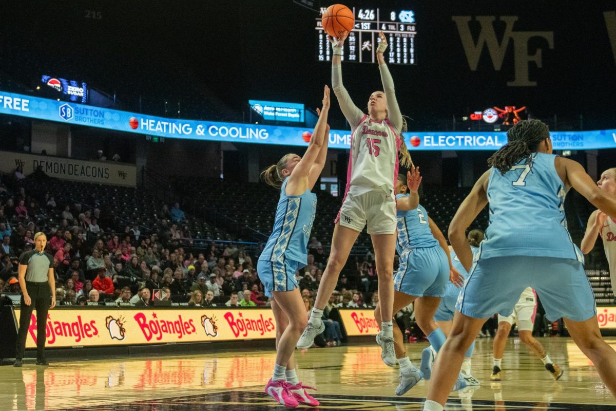 Sophomore Forward Kennedy Moore (15) goes up for the short ranged jumper against the North Carolina Tar Heels on Sunday.