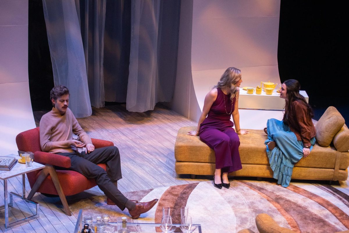 Ashlyn Collings and Gabi Velinova excitedly engage in conversation as Bennett Haara's character grows envious of their friendship.