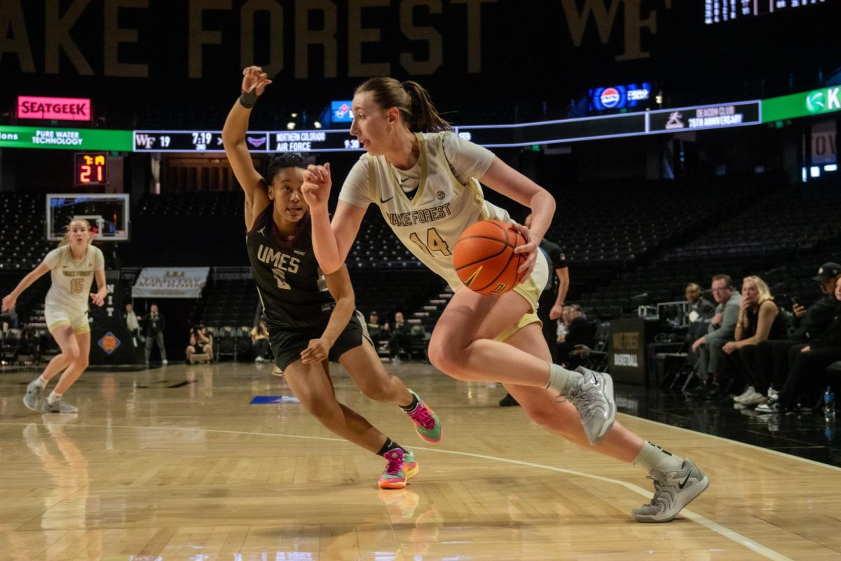 Mary Carter (14) beats her defender to the basket against Maryland Eastern in the first round of the NIT.
