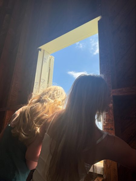 Amid senior year traditions, like signing the Wait Chapel, student Towne Moore remembers her many cherished moments at Wake Forest. (Courtesy of Towne Moores)