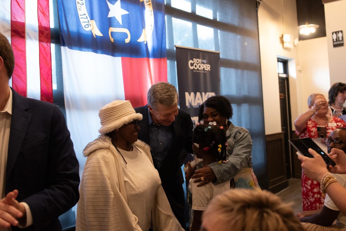 Roy Cooper meets with "Make Stuff Cost Less" event attendees in Winston-Salem, N.C.